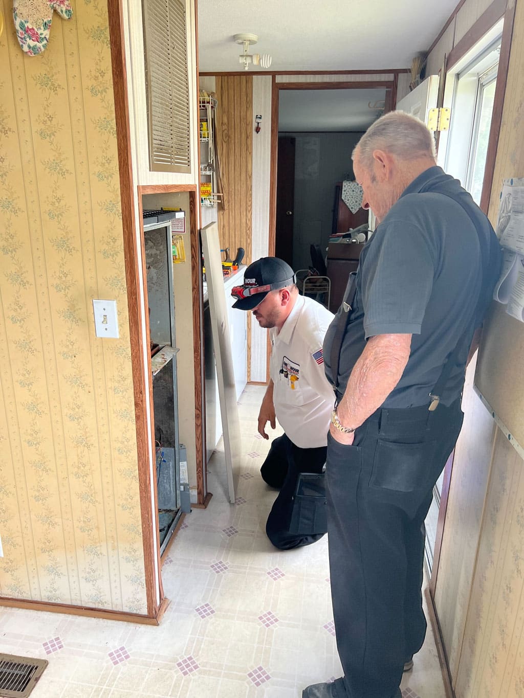 AC Repair technician servicing a Dallas, TX resident's air conditioning system.