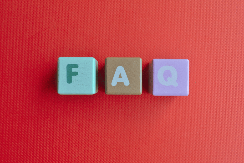 FAQ on wooden blocks in different colors with a red background Residential HVAC Code Requirements dallas tx addison tx ft worth tx 