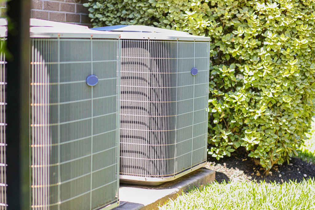ac unit surrounded by bushes air conditioning service aledo tx ft worth tx 