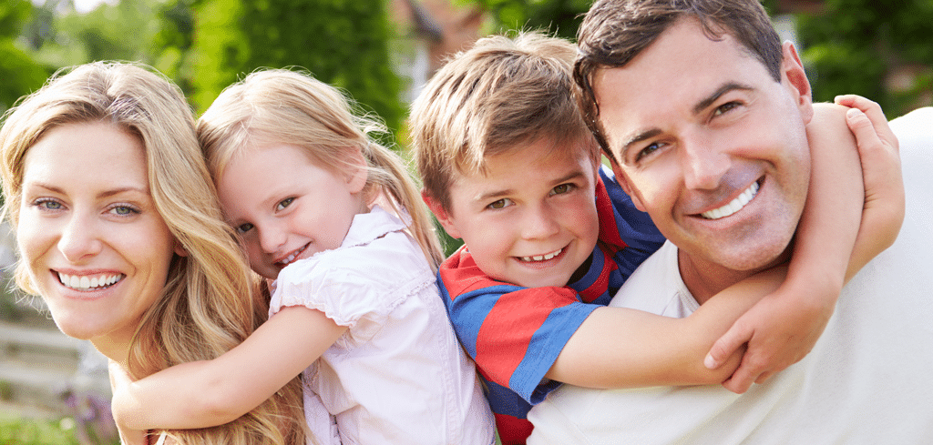 Portrait Of Happy Family In Garden | Maintenance Tips for Optimal Performance in Irving, TX