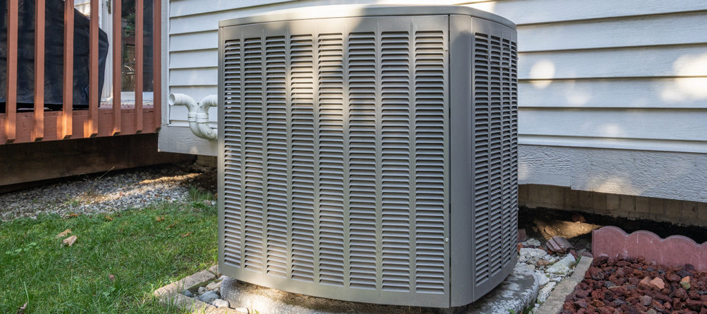 Outdoor AC Unit beside a home in Plano, TX