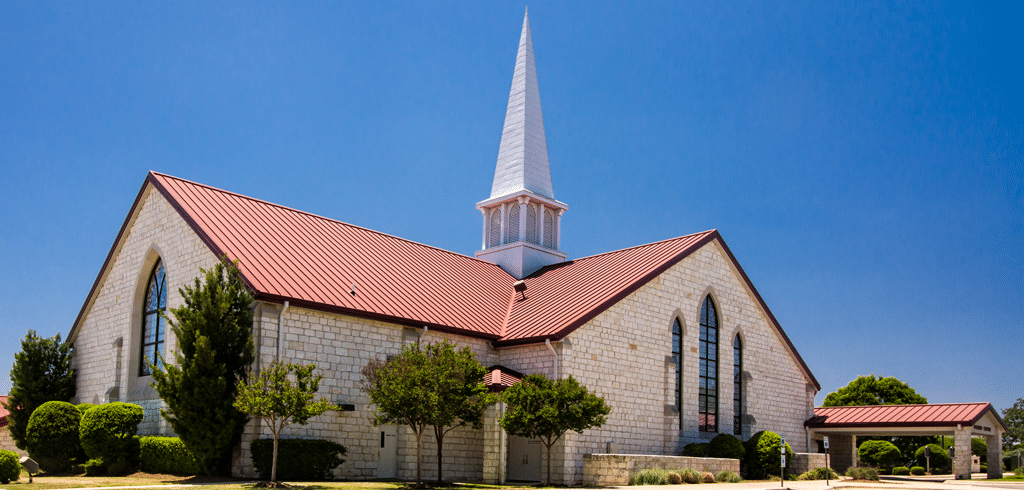 Dallas, TX area Church with a red roof and steeple