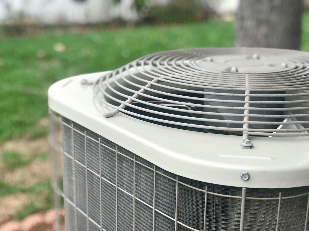 up close image of a modern ac unit heating and air conditioning service bedford tx boyd tx allen tx 