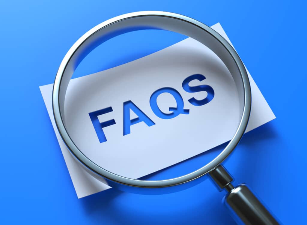 FAQs concept on white paper with magnifying glass. FAQs for Residential HVAC Inspection with One Hour Air Conditioning & Heating of Dallas
