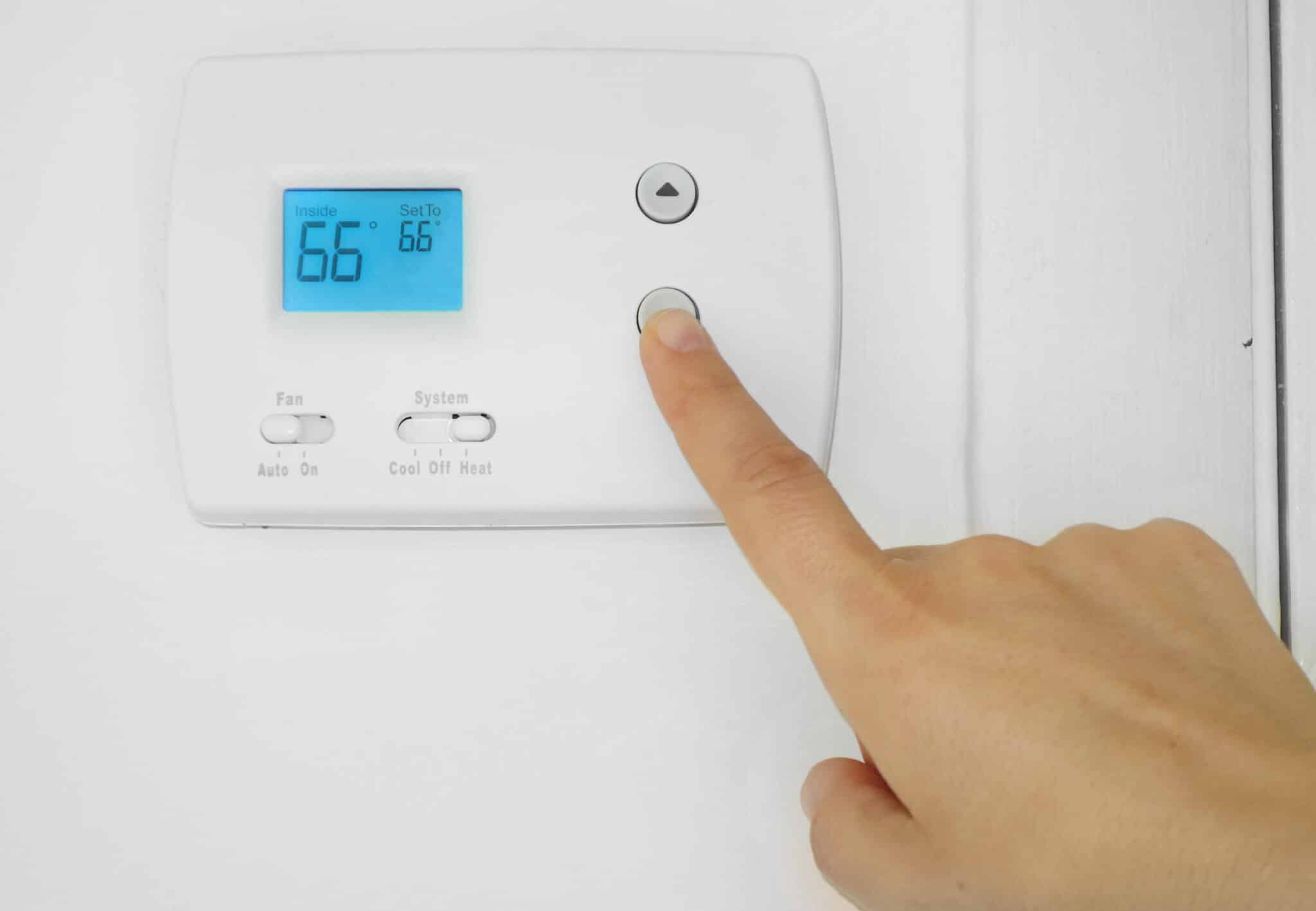 Thermostat adjustment, HVAC Solutions.