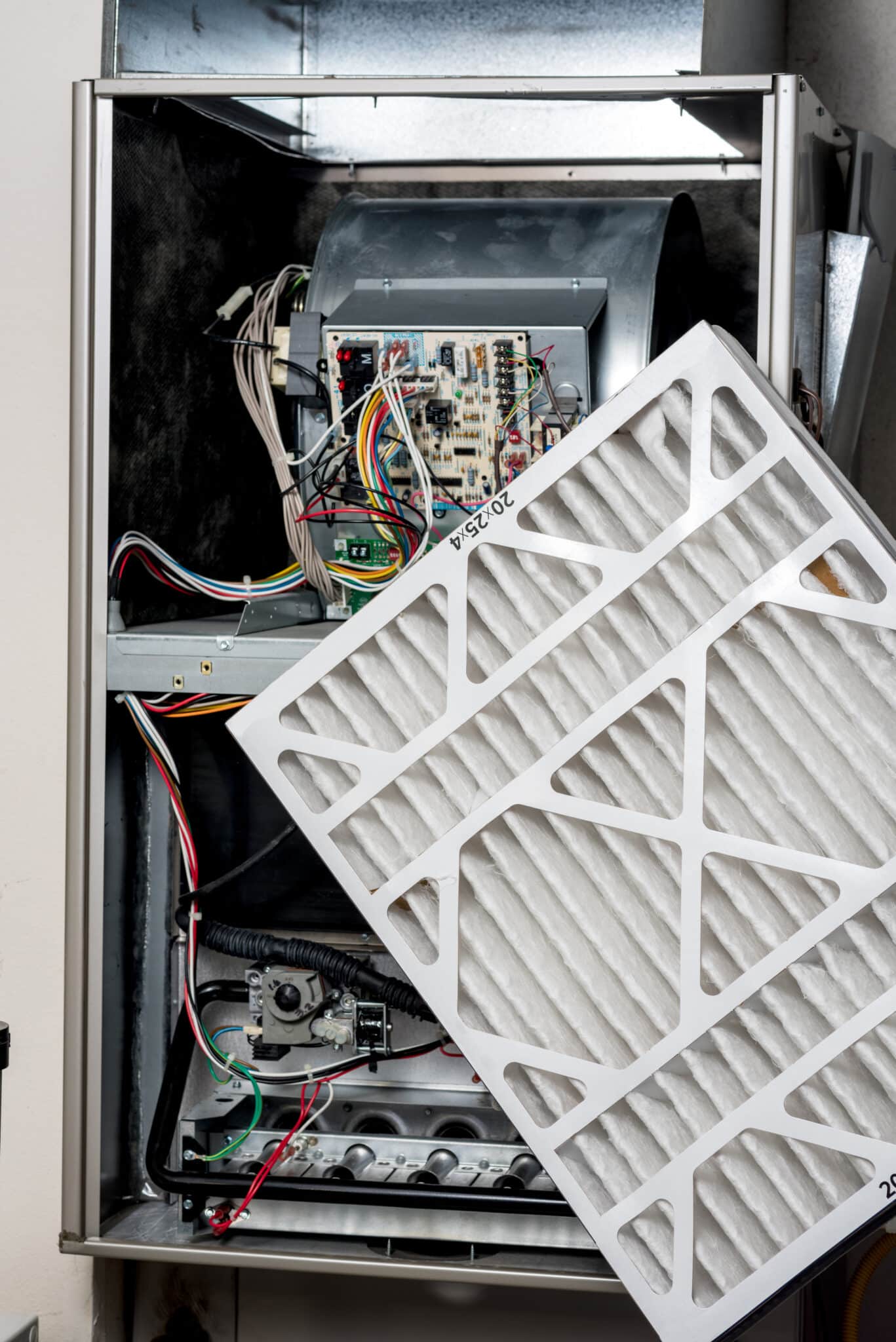 Replacing a furnace filter with a new one, Managing Heat.