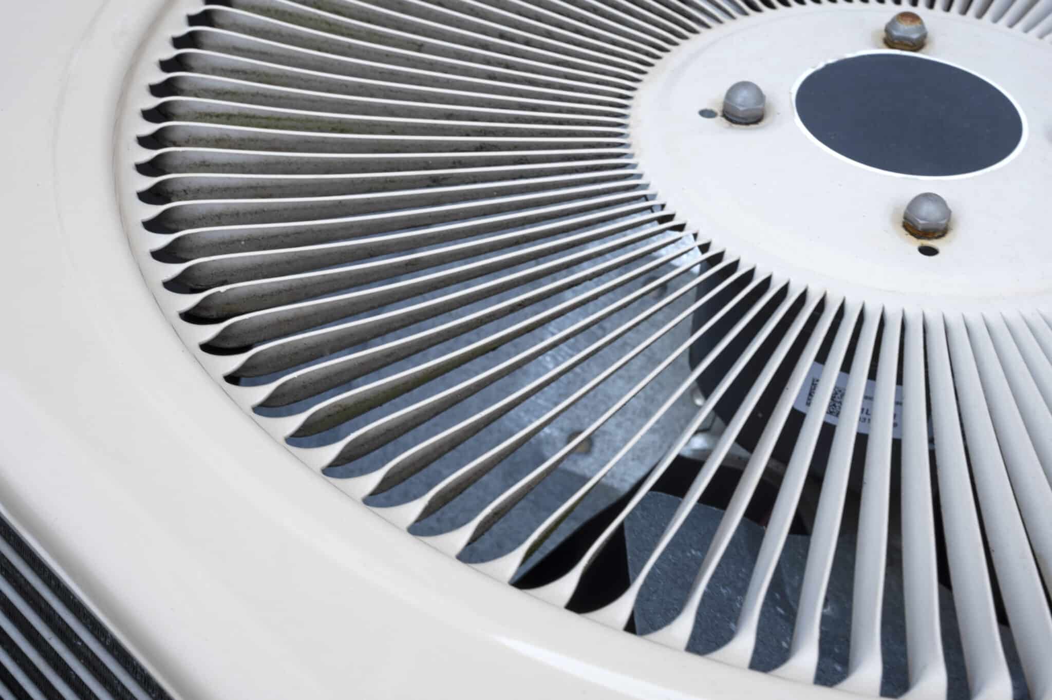 An air conditioning system unit installed on the house's exterior ensures comfort with Silent HVAC Solutions.