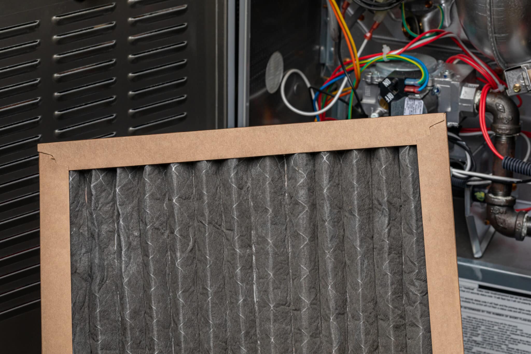 Dirty furnace filter. HVAC maintenance, Furnace Repair Services.