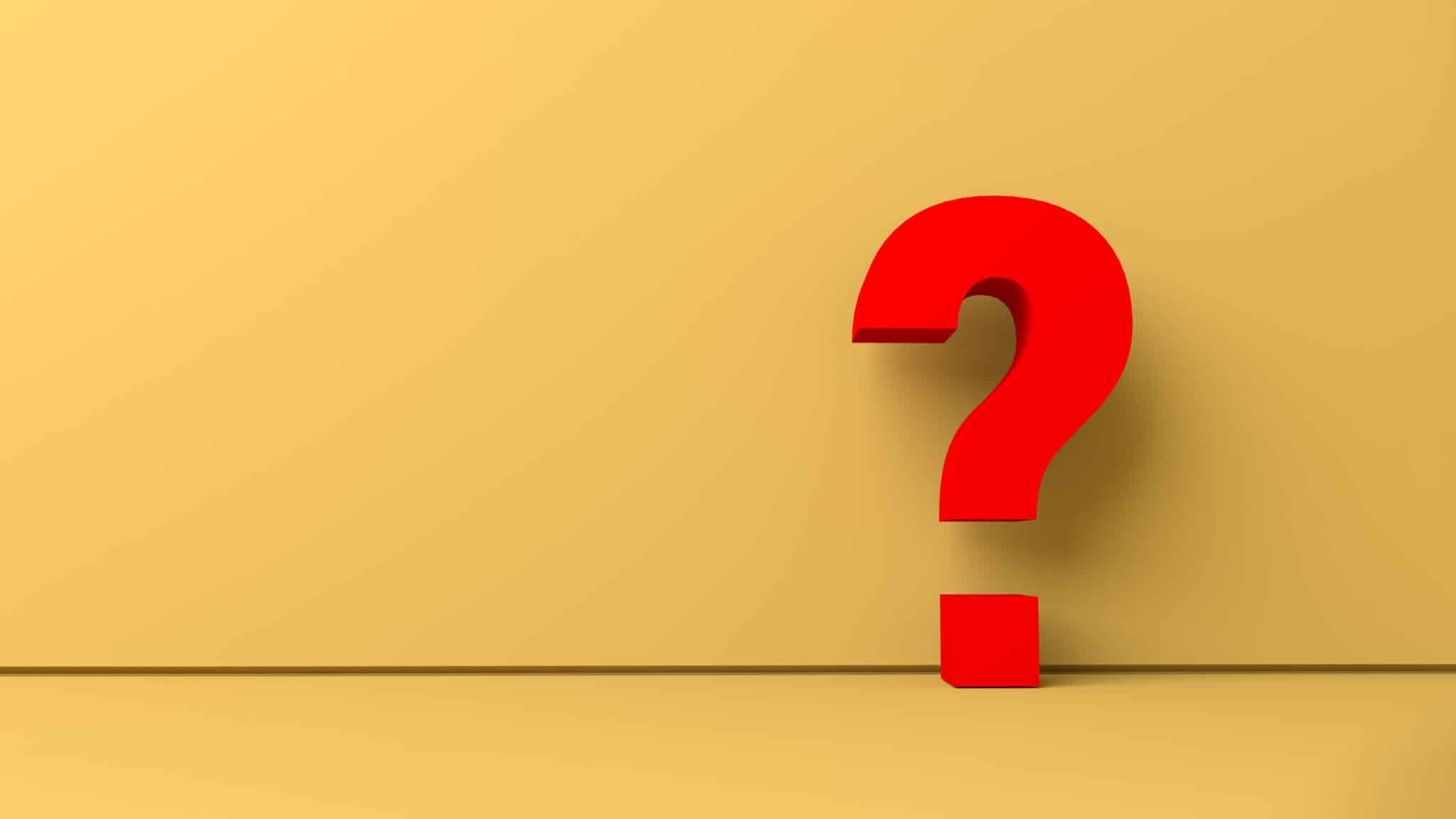 Red question mark on a yellow background wall and floor, Zoning Systems Maintenance.