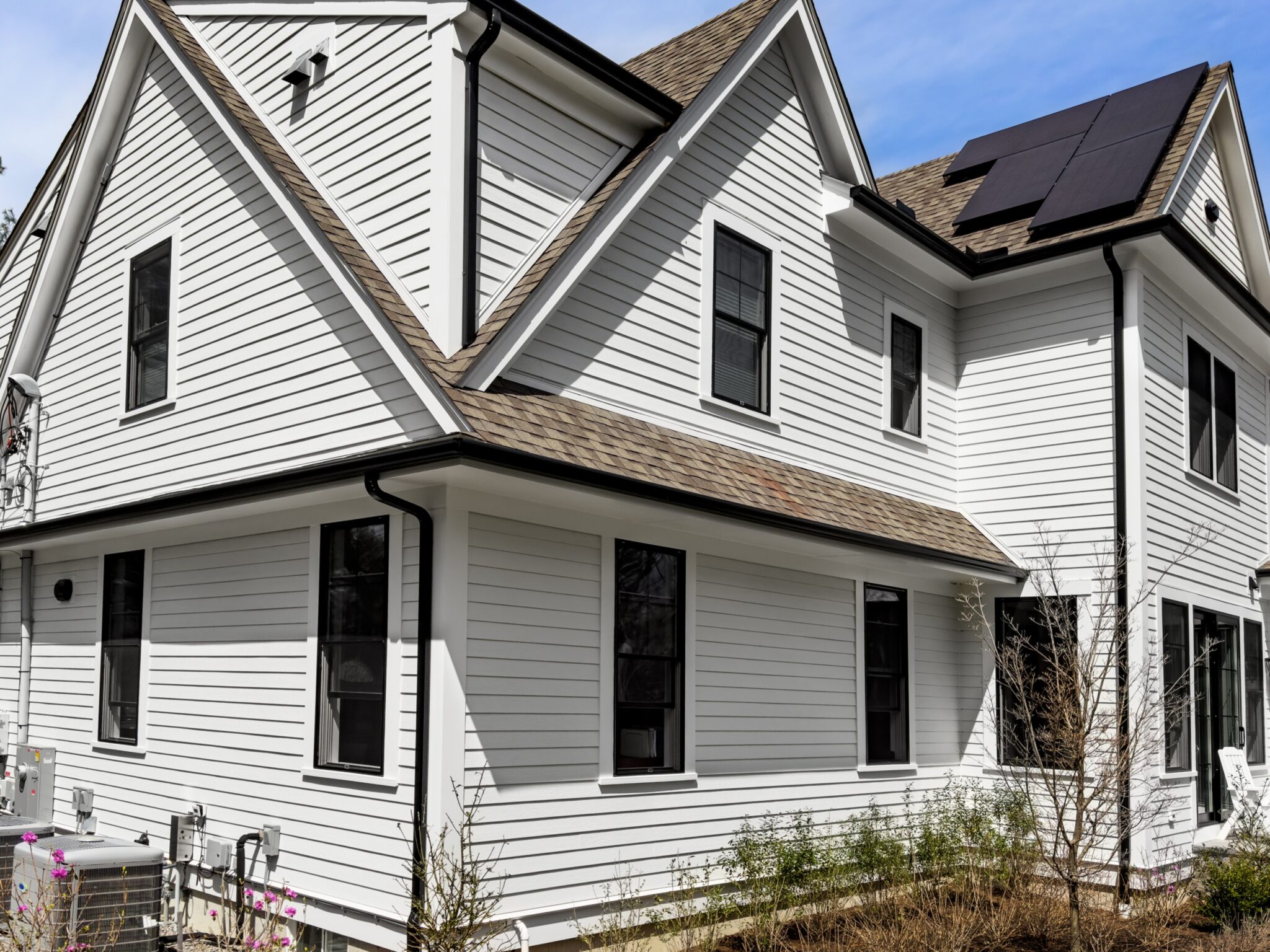 Solar panel and HVAC unit, HVAC in Environmental Sustainability.